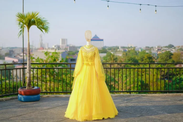 Woman in yellow dress at outdoor event